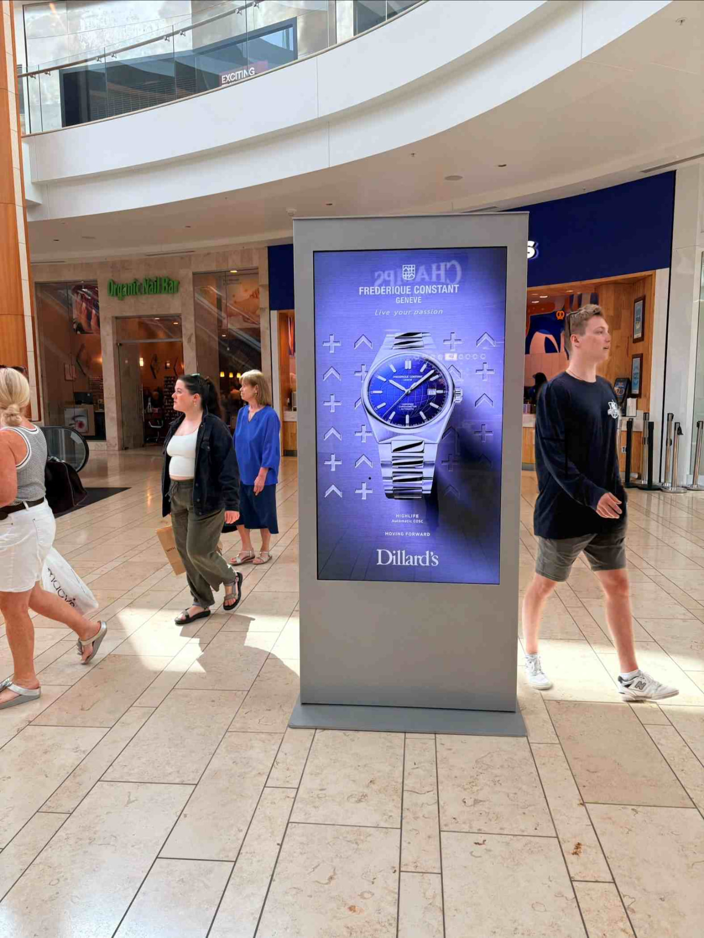 Digital advertising kiosk inside a shopping mall